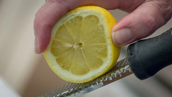 Zesting a lemon.