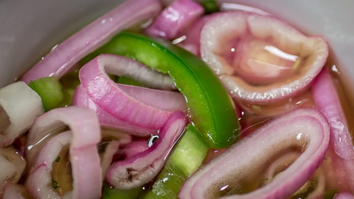 A close up view of the quick-pickle Jalapeño Shallot Relish.