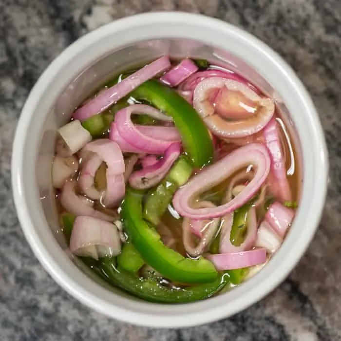 The quick-pickled relish you make yourself: Jalapeño Shallot Relish.