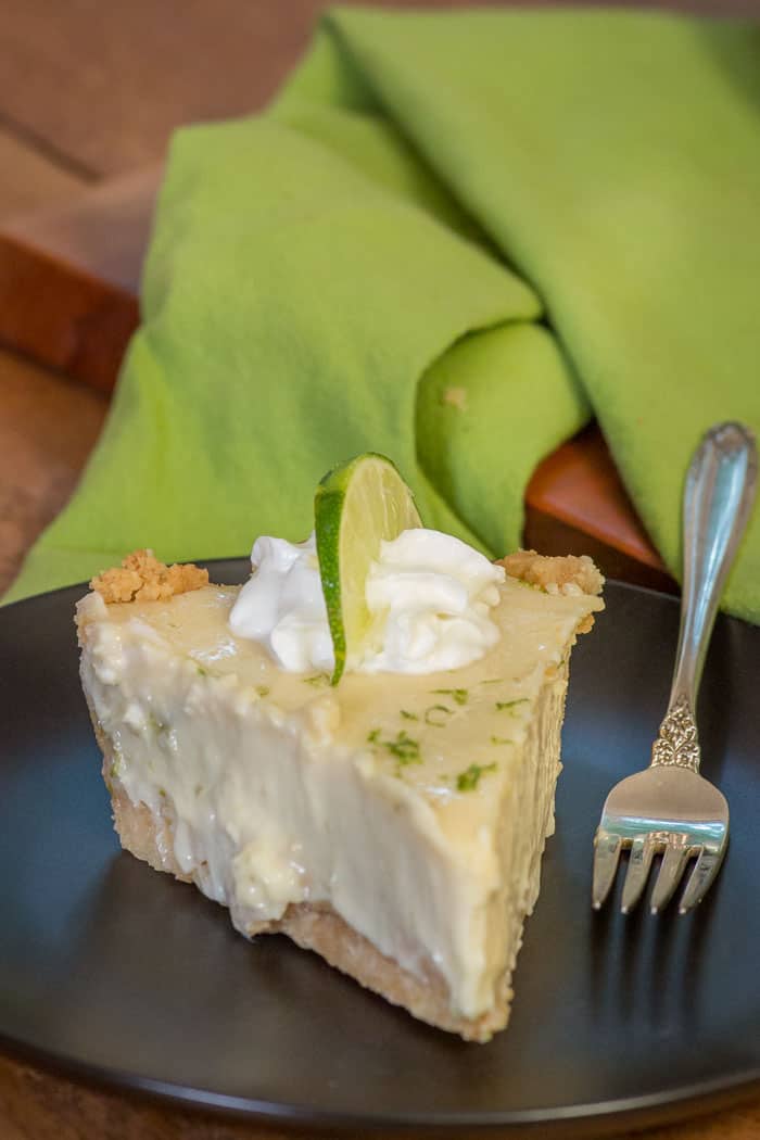 A slice of Key Lime pie with shortbread crust.
