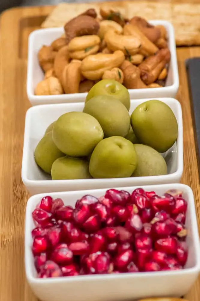 The little dishes on my new charcuterie board begged to be filled with num-nums on which to nosh.