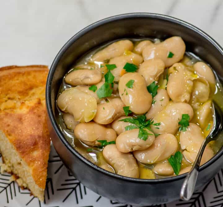 How to Make the Best White Beans, with a slice of cornbread.