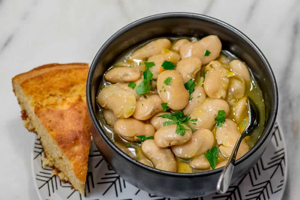 How to Make the Best White Beans, with a slice of cornbread.