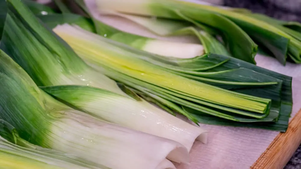 Leeks that have been sliced in half, lengthwise.