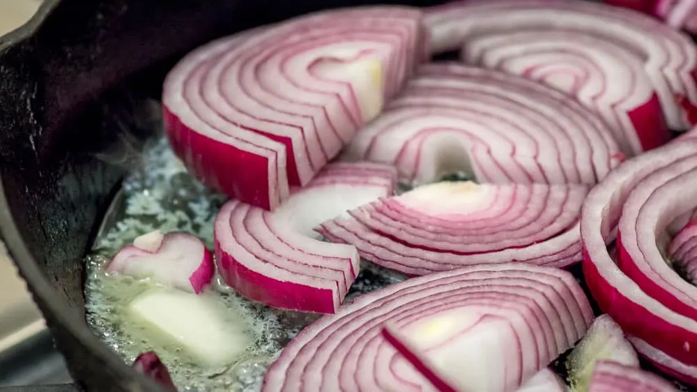 Beginning to sauté the onions in the butter and olive oil.