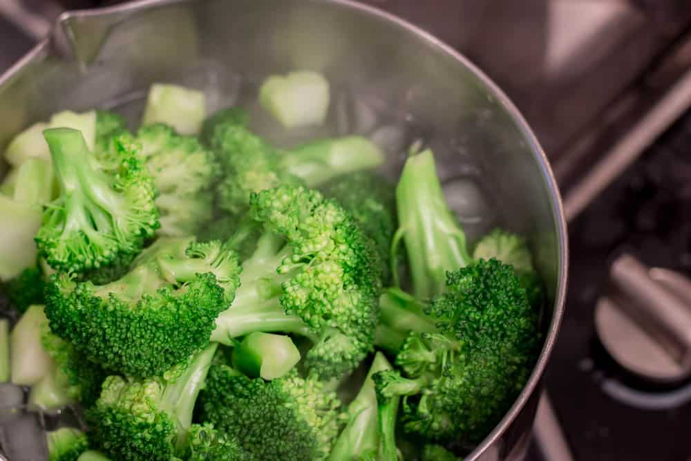 After boiling it for a minute, you chill down the broccoli in an ice bath.