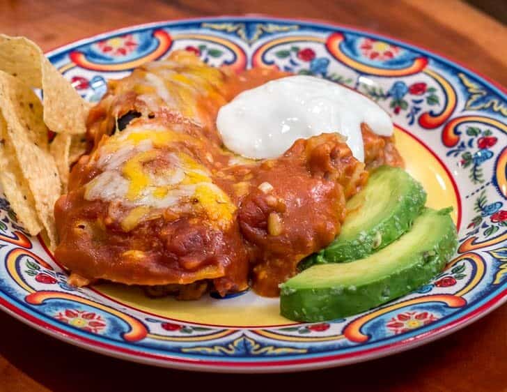The closeup of the plate of enchiladas.