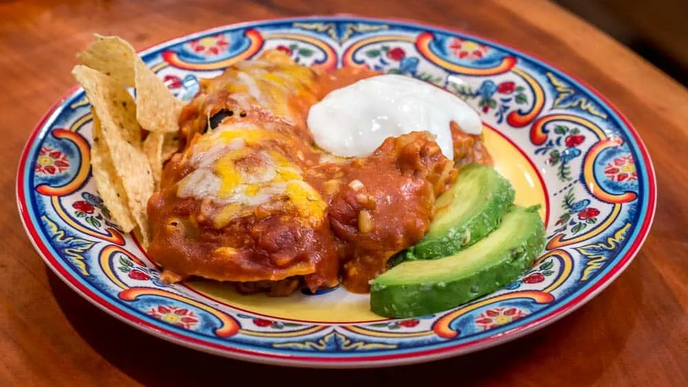 The closeup of the plate of enchiladas.