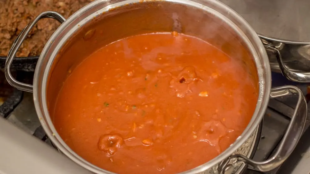 Bubbling enchilada sauce.