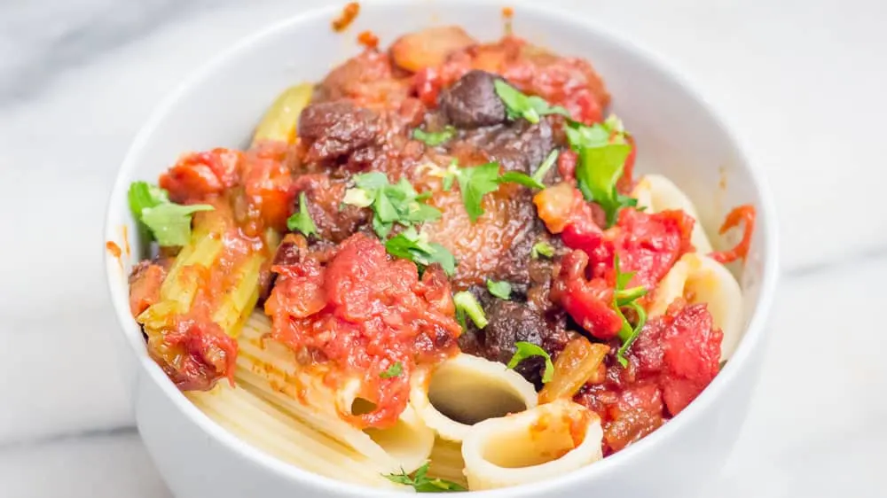 Oxtail Braised in Wine, served over Rigatoni pasta.