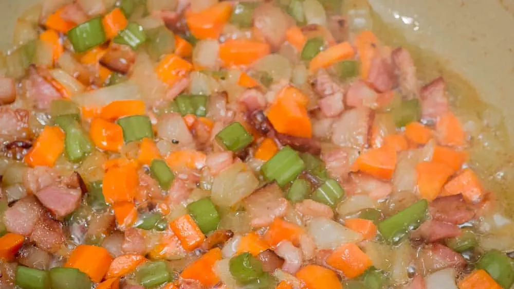 Sauté the veggies till the onions start to become translucent.