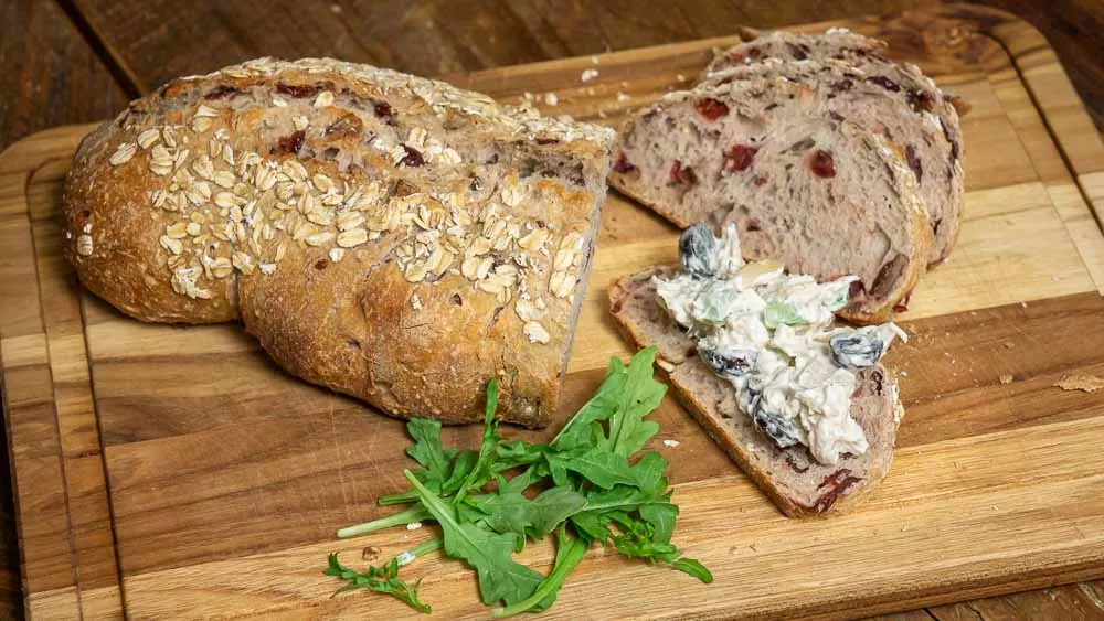 Homemade hicken salad on cranberry pecan sourdough from Wildgrain.