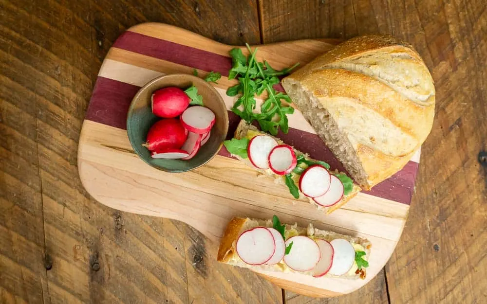 The snack of French schoolchildren: crusty bread, thinly sliced radishes, butter, and salt. 