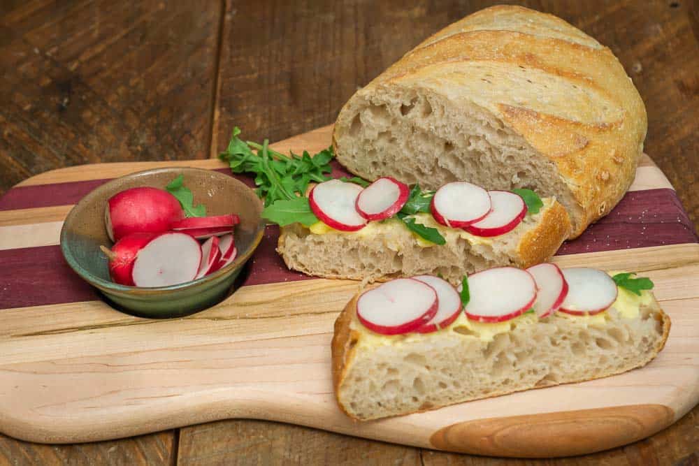 The snack of French schoolchildren: crusty bread, thinly sliced radishes, butter, and salt. 