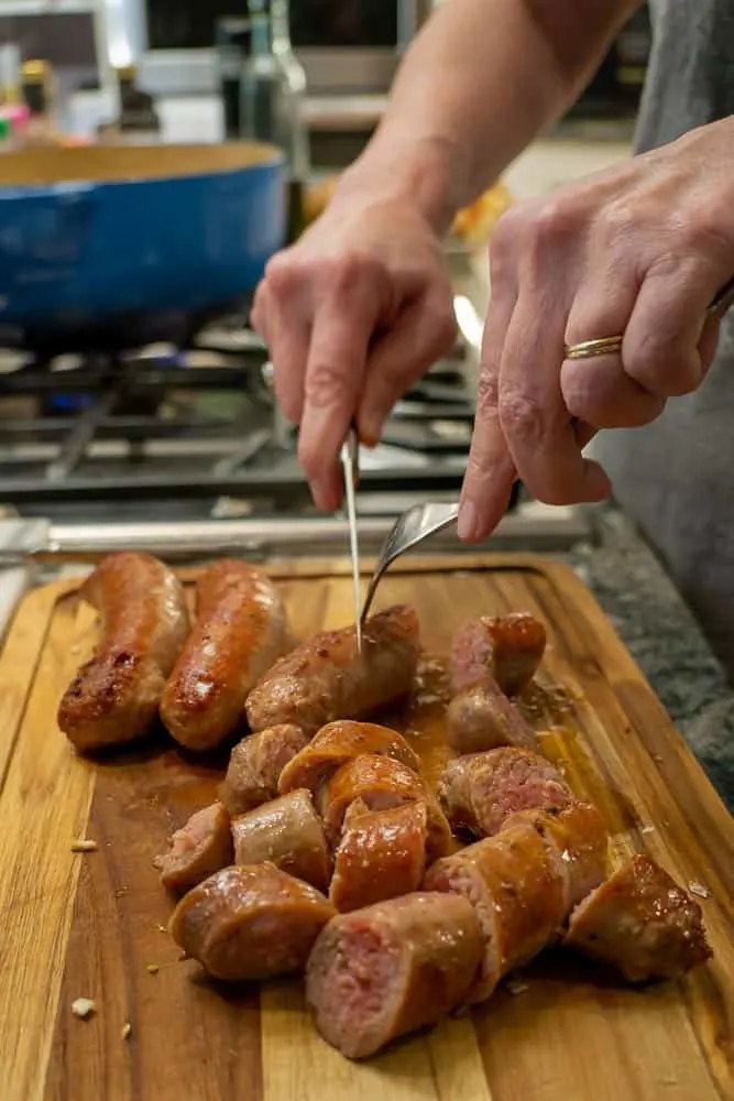 Slice the browned sausage into 1 inch chunks.