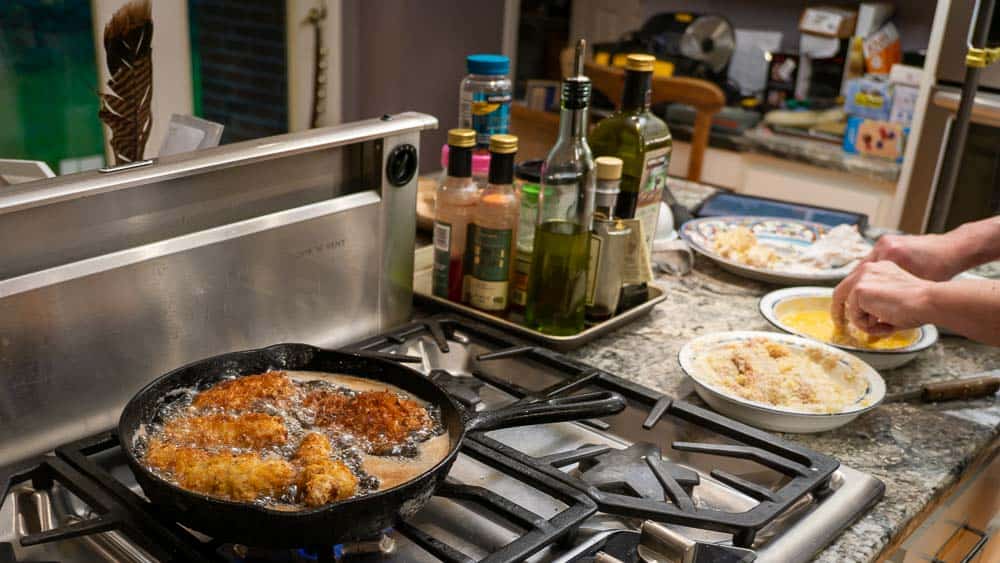 Frying up the turkey tenders.