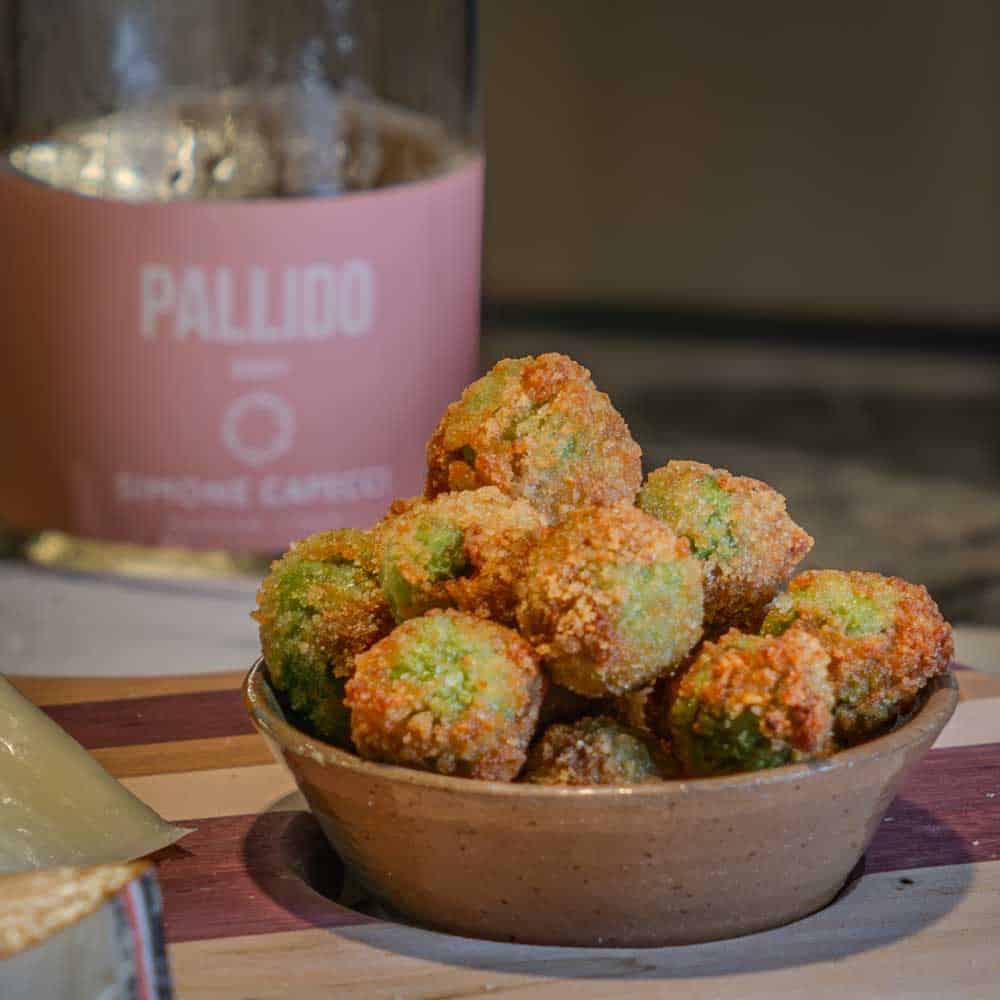 Italian Meat-Stuffed Fried Olives: Olive all'Ascolana go beautifully with this scrumptious rosé from the vineyard of Simone Capecci.