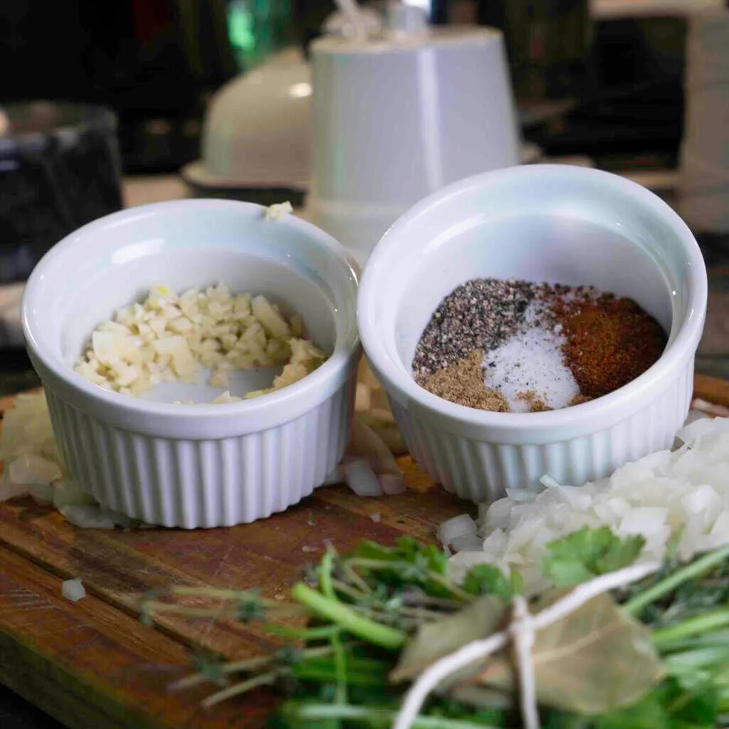 Spices for the beans, the minced garlic, and the bouquet garni of cilantro.